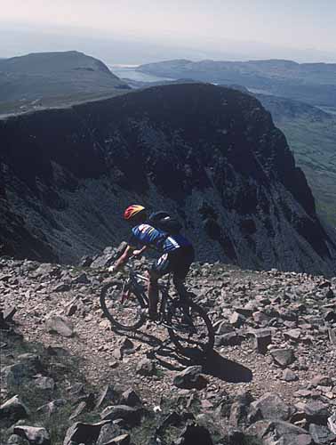 Mountain biking at summit of Cadair Idris ©Photolibrary Wales